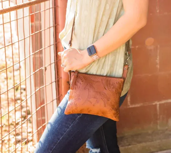 American West Handbag Hitchin' Post Collection: Trail Rider Crossbody Tooled Hip