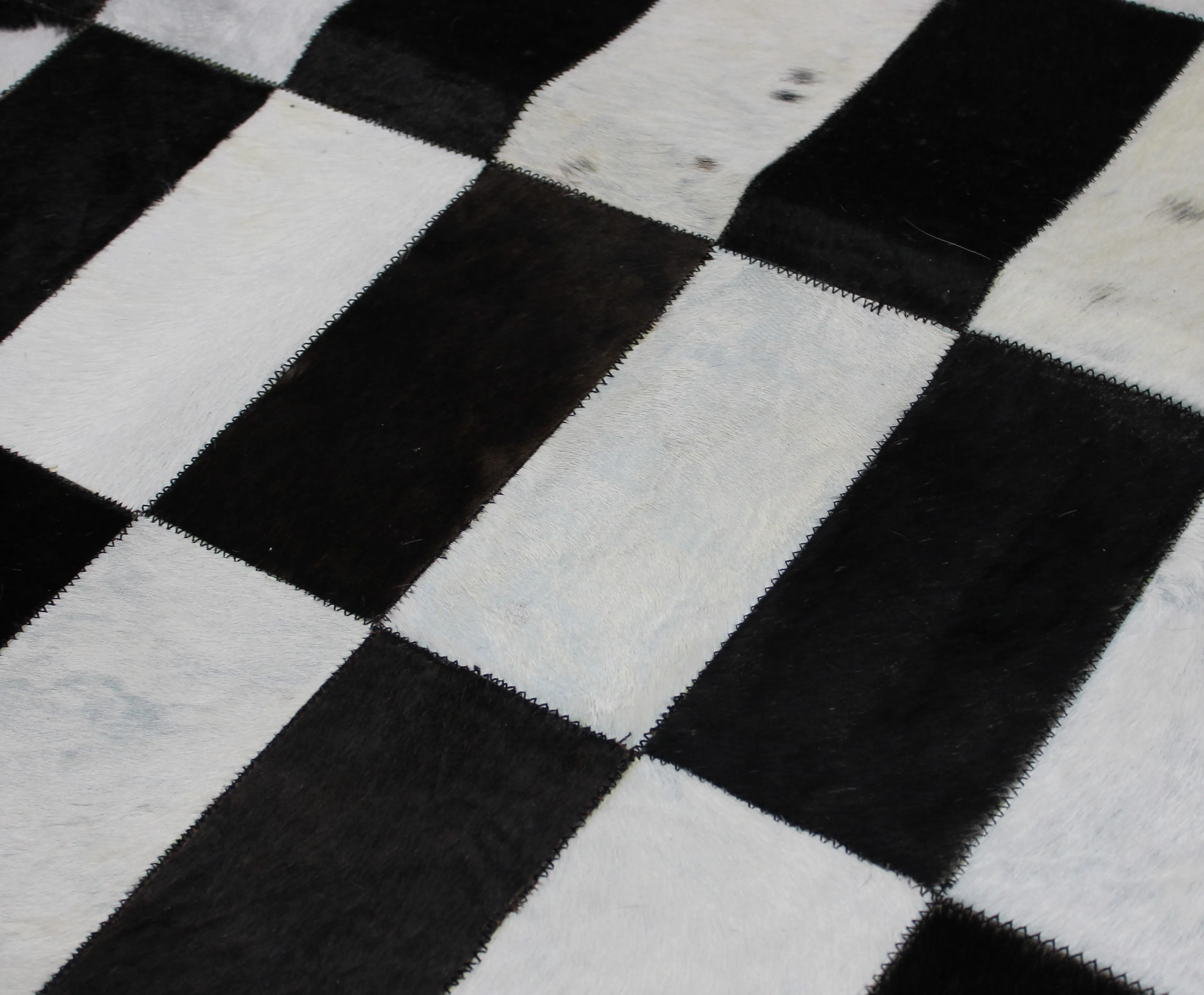 Black & white Patchwork Cowhide Rug –  Size 47 x 41 IN | 119x 105 cm | Premium Cowhide Rug
