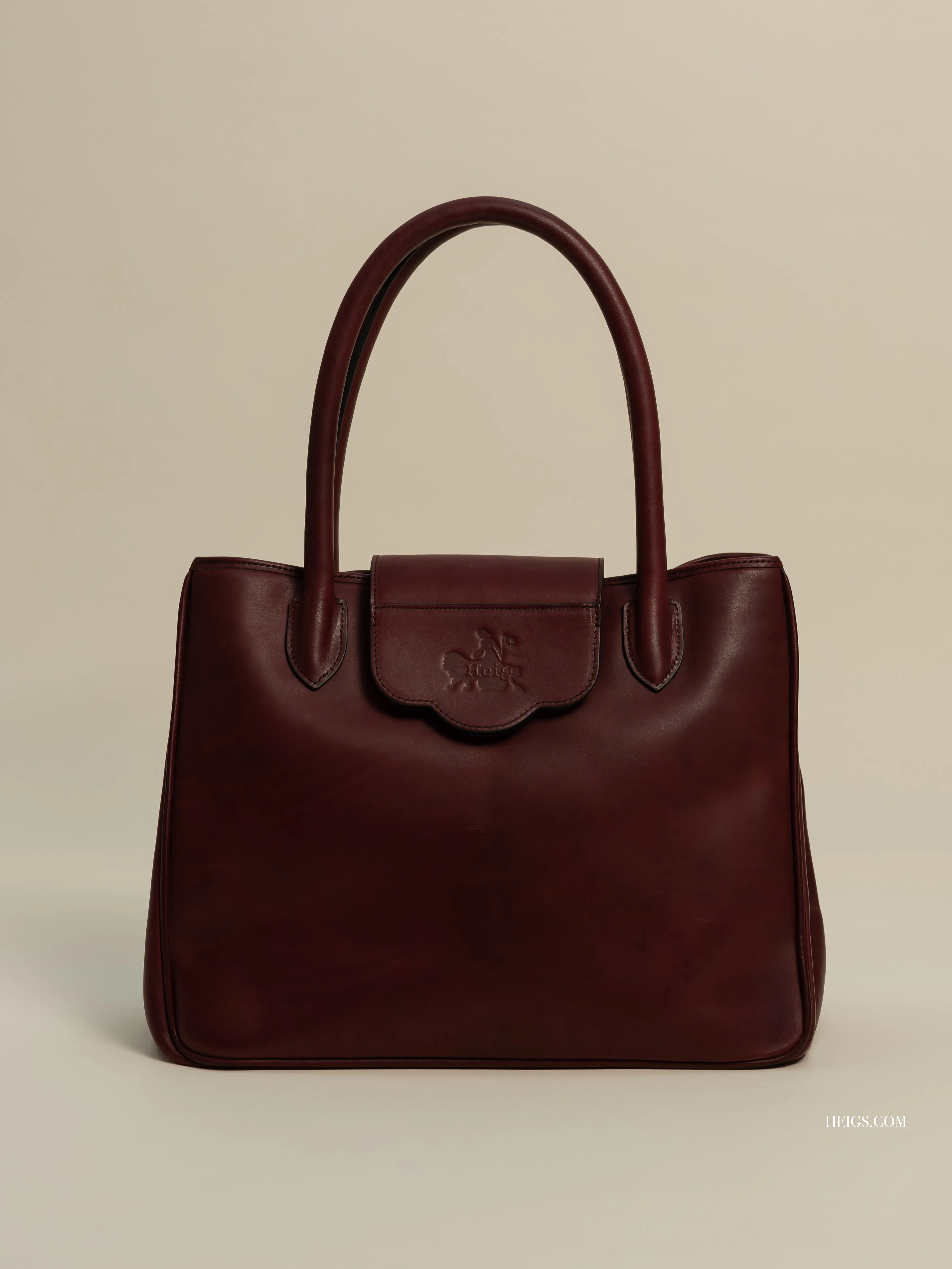''...EN SUISSE'' IN BURGUNDY RED (L)