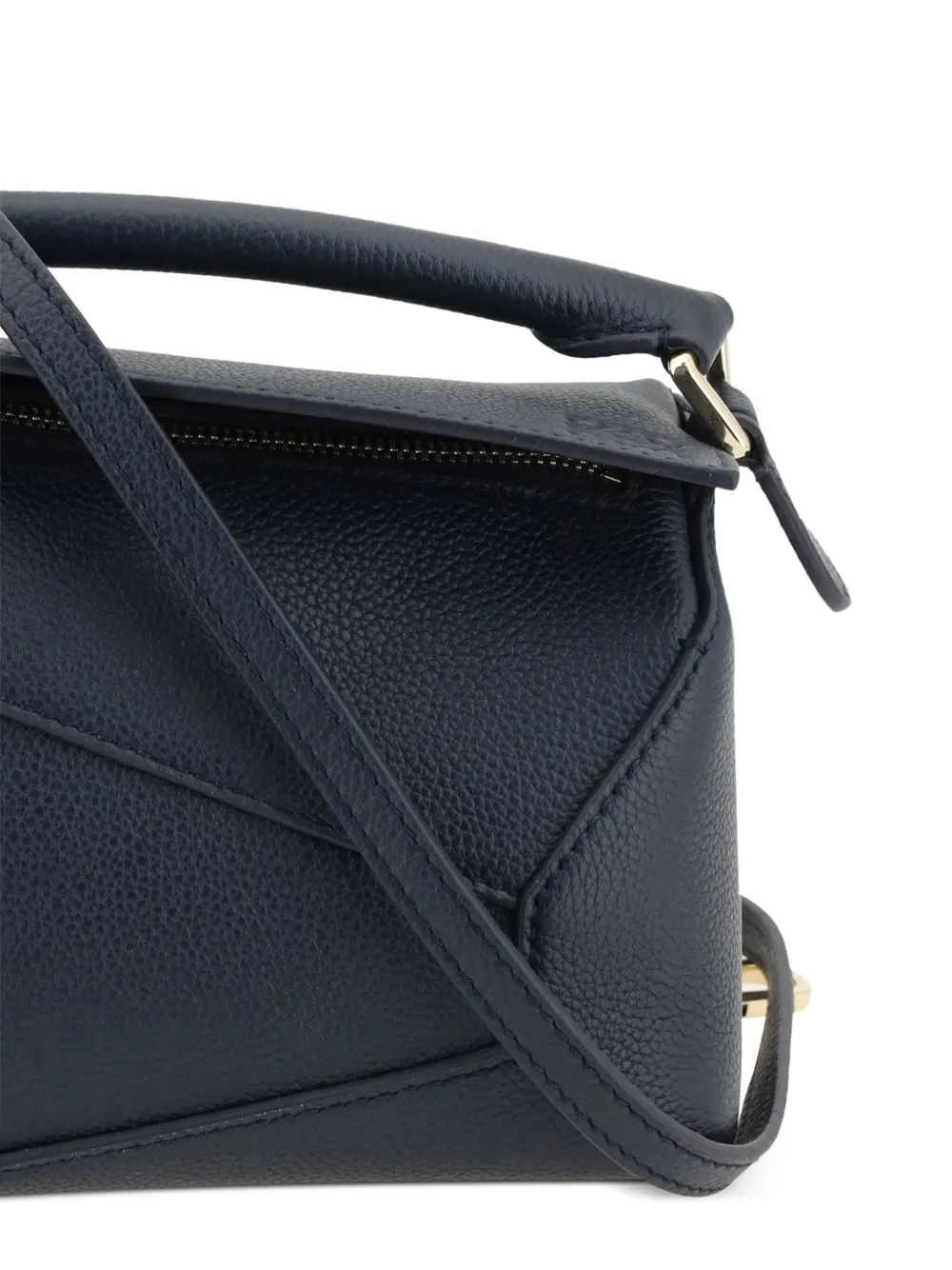 Puzzle edge mini leather handbag