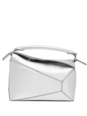 Puzzle edge small leather handbag