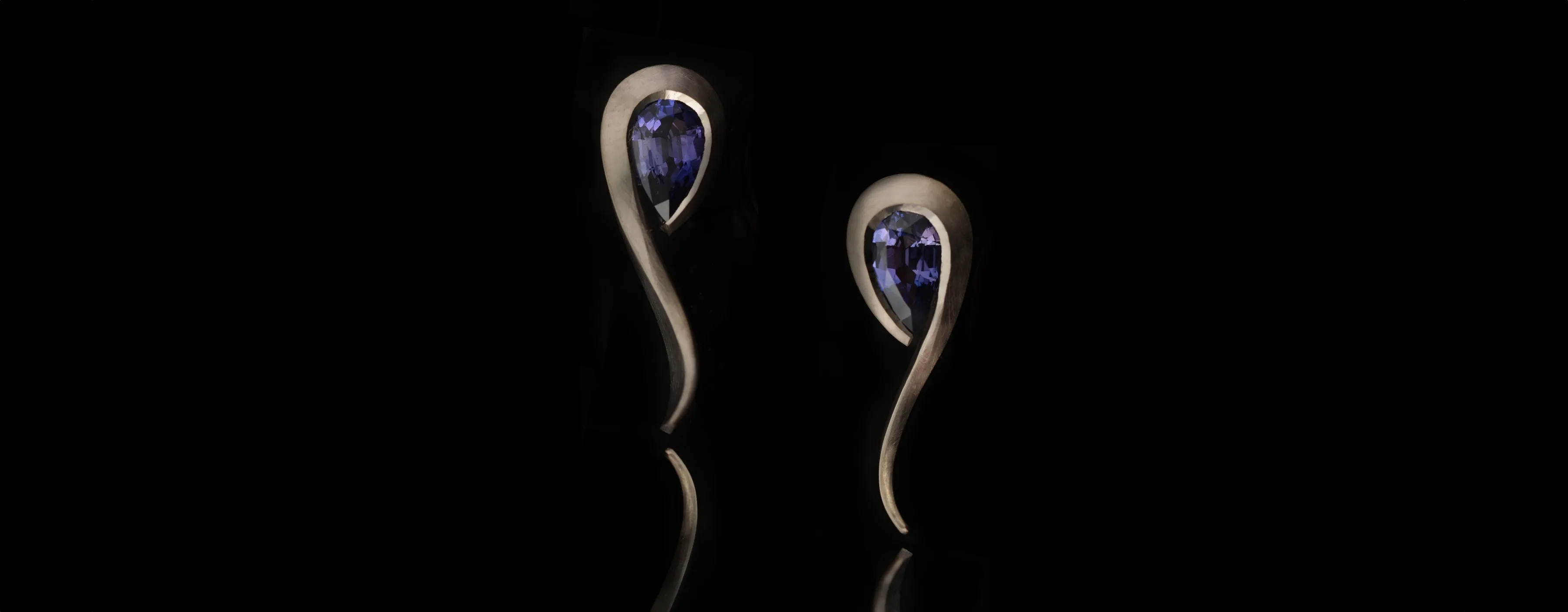White gold and Purple Sapphire Twist Earrings